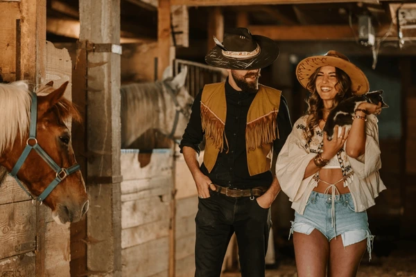 smiling-young-rancher-couple-western-600nw-2476931437